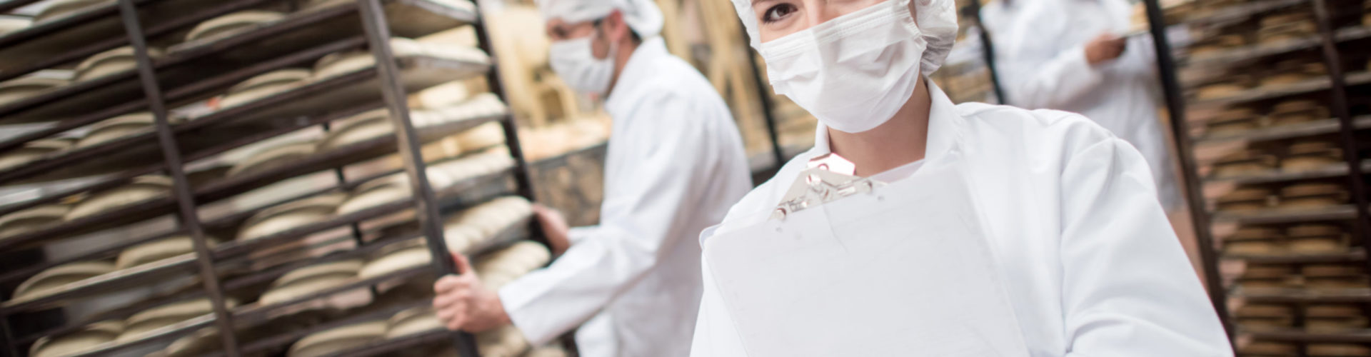 Woman Working At A Food Factory