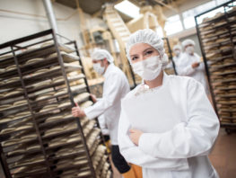 Woman Working At A Food Factory